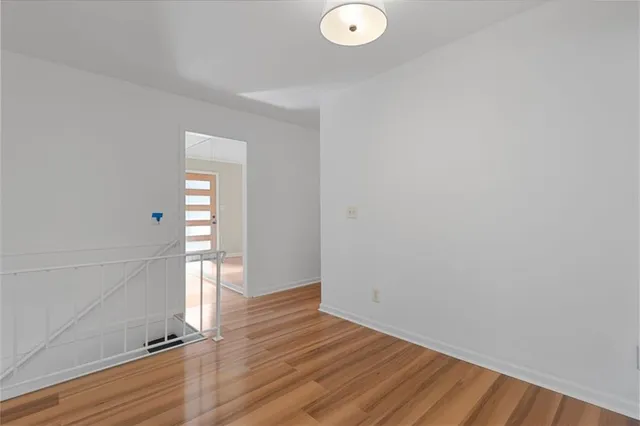 a view of a livingroom with wooden floor