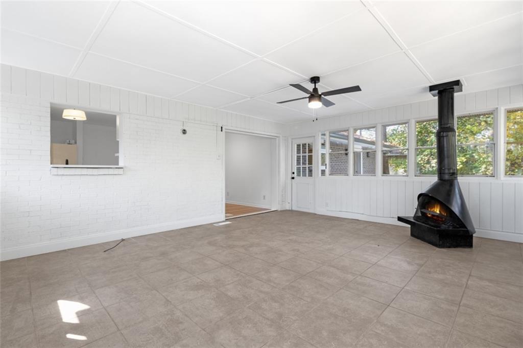 2958 Harcourt Drive, Unit 1 Decatur, GA 30033 - Photo 15 of 32 a view of a livingroom with a ceiling fan and window