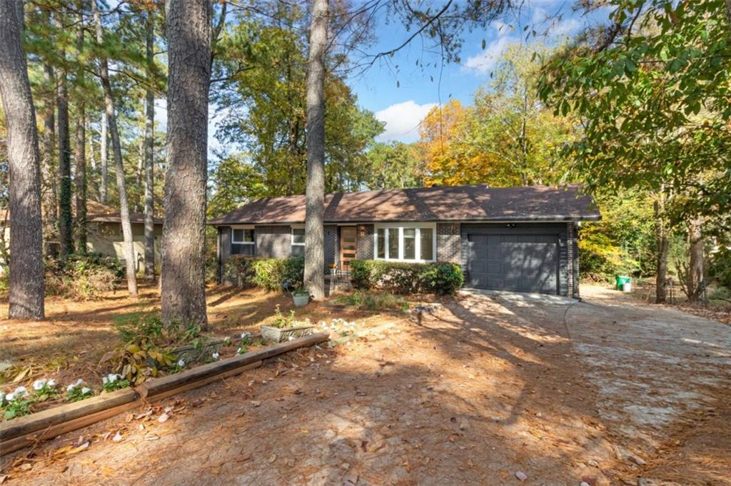 2958 Harcourt Drive, Unit 1 Decatur, GA 30033 - Photo 2 of 32 a view of a house with a yard