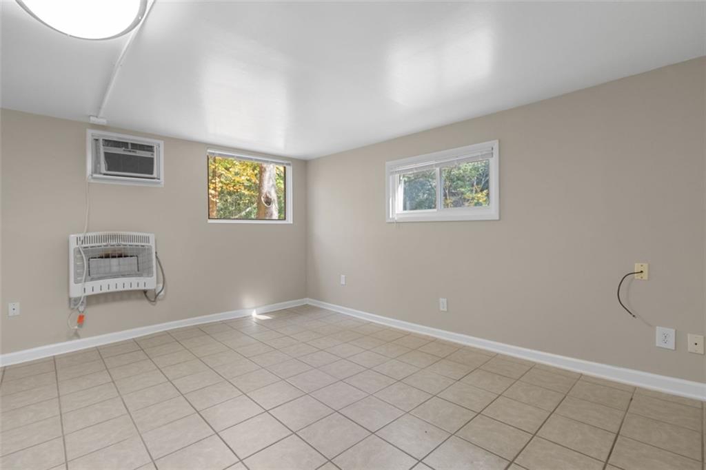 2958 Harcourt Drive, Unit 1 Decatur, GA 30033 - Photo 27 of 32 a view of an empty room with a window