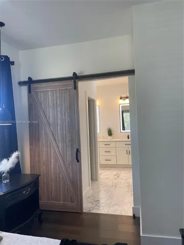 a view of bedroom and bathroom