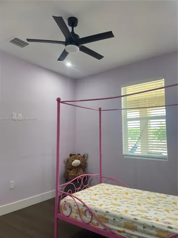 a view of a chairs and tables in the patio