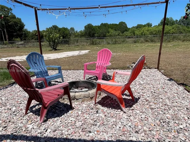 a view of a street with a building in the background