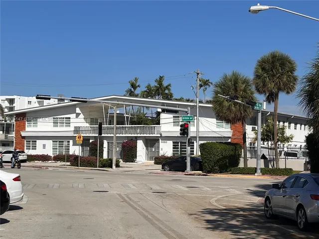 a front view of a building with a street