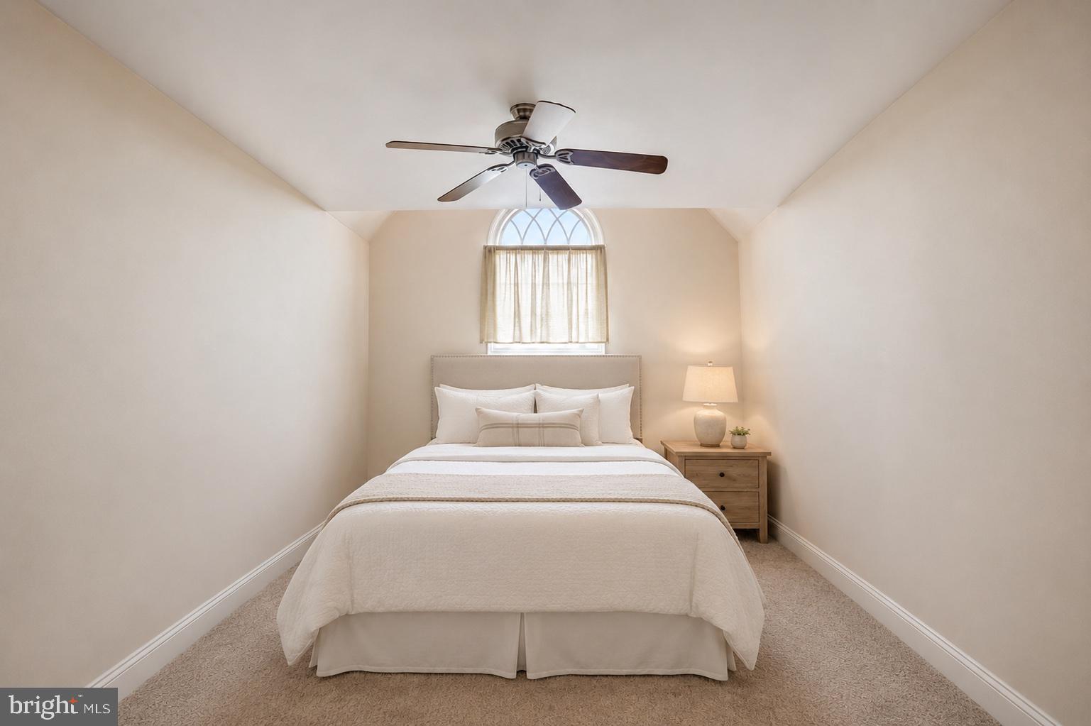 434 Meetinghouse Road Ambler, PA 19002 - Photo 42 of 51 a bedroom with a bed and a chandelier