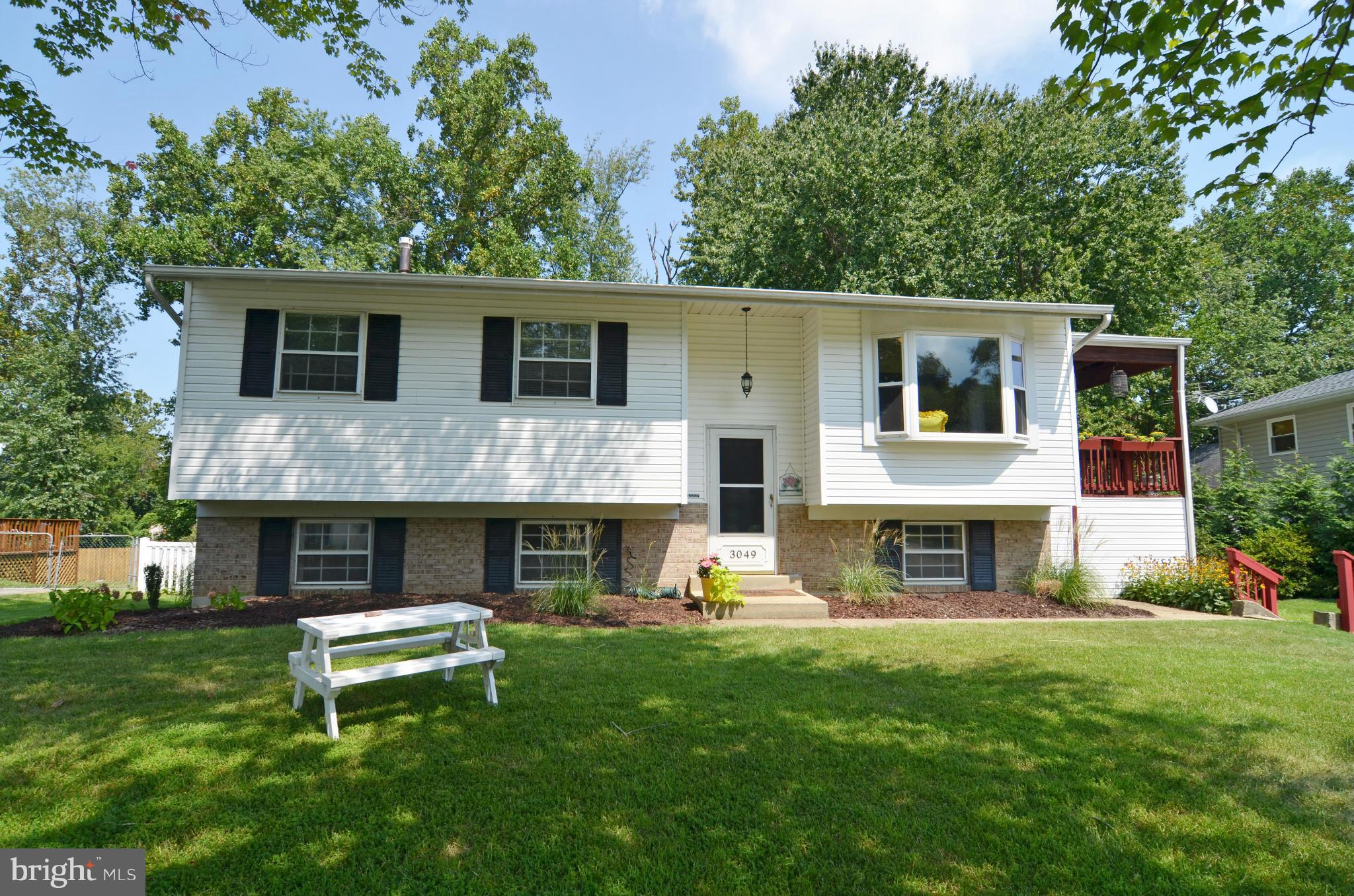 3049 Perch Drive Riva, MD 21140 - Photo 1 of 27 a view of house with a yard and a large tree