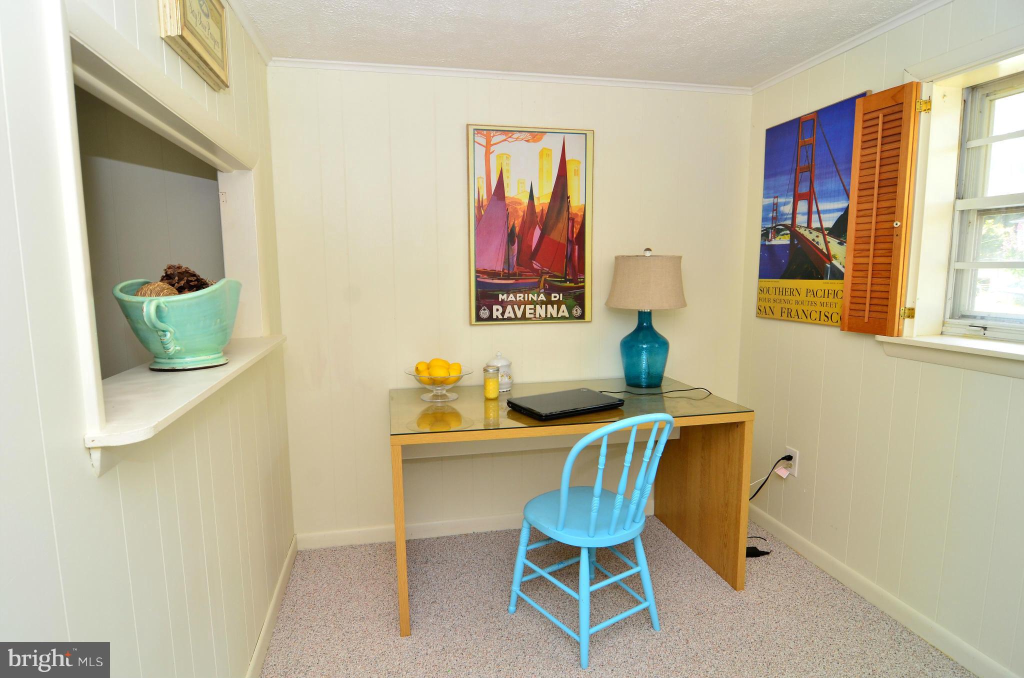 3049 Perch Drive Riva, MD 21140 - Photo 17 of 27 a view of a workspace with furniture and a window