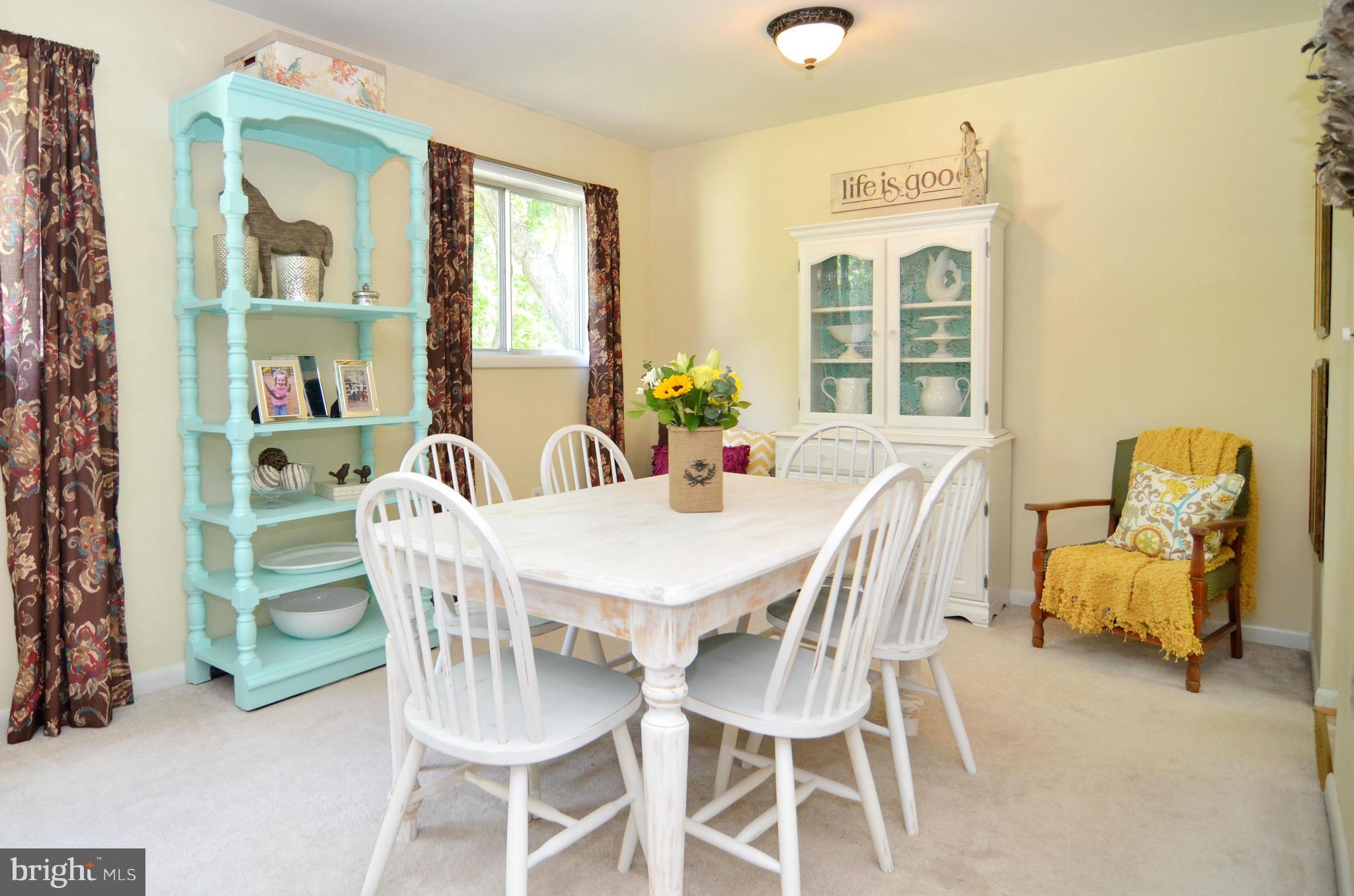 3049 Perch Drive Riva, MD 21140 - Photo 6 of 27 a view of a dining room with furniture and windows
