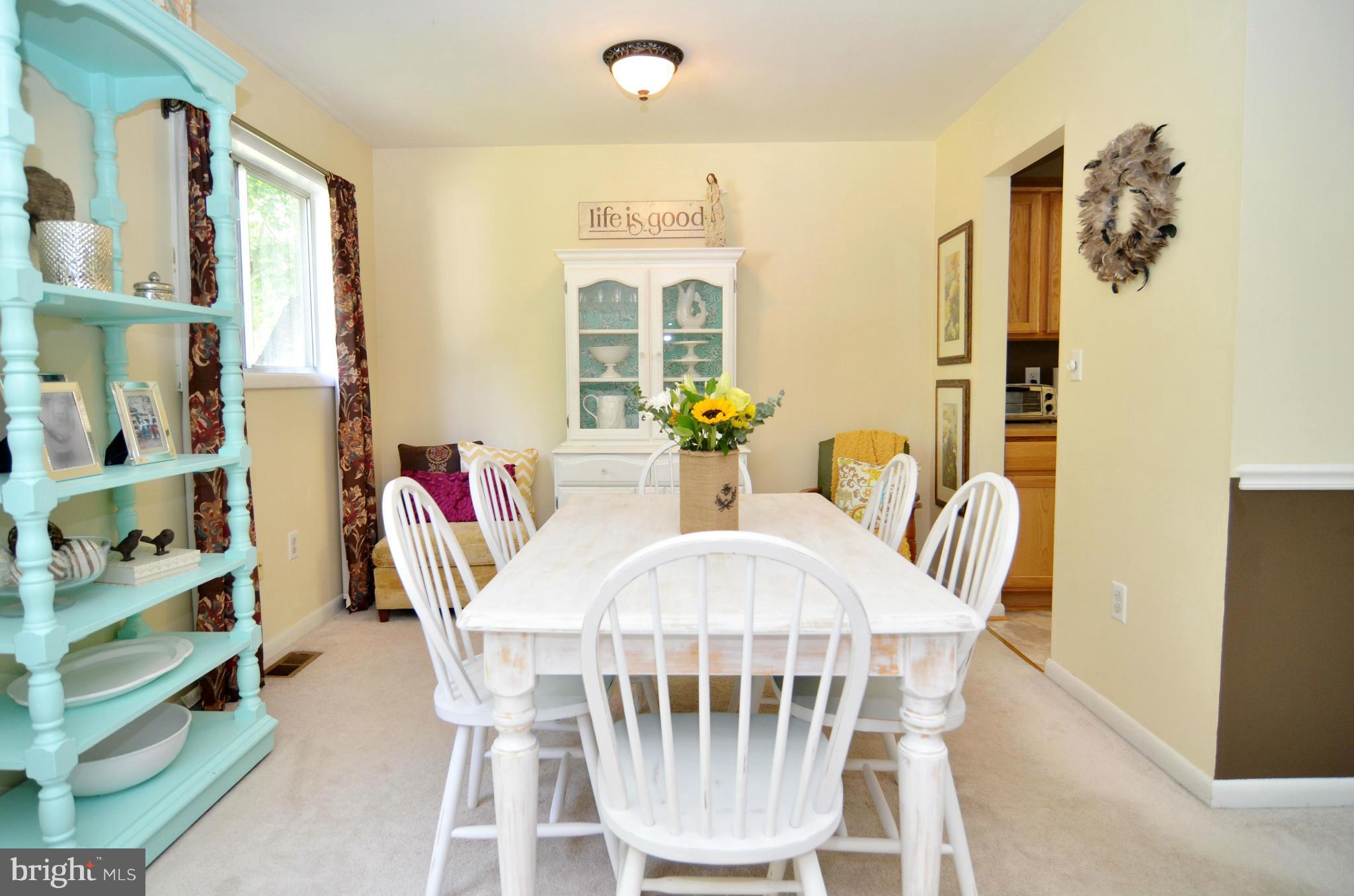 3049 Perch Drive Riva, MD 21140 - Photo 7 of 27 a view of a dining room with furniture window and wooden floor