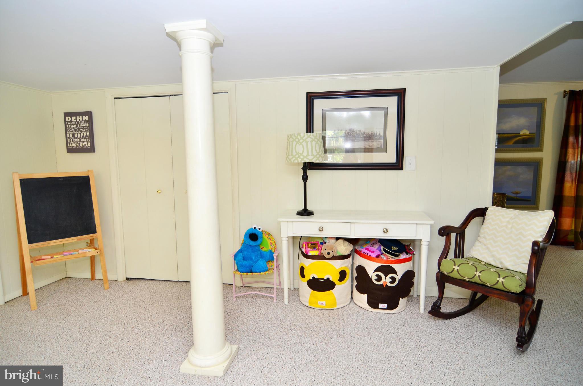 3049 Perch Drive Riva, MD 21140 - Photo 8 of 27 a view of game room with window and couch