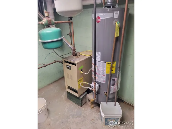 a bathroom with a toilet and a sink