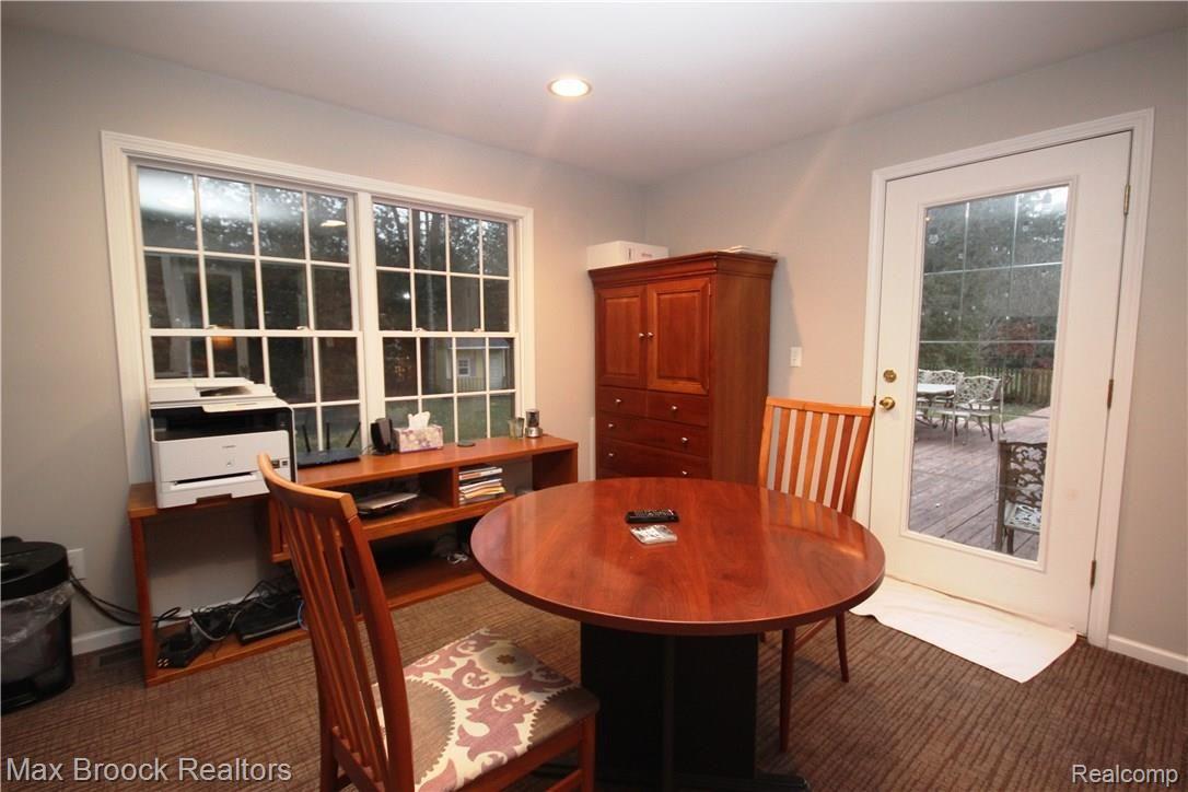 32630 Old Post Road Franklin, MI 48025 - Photo 7 of 33 Main floor study opens up to the huge deck