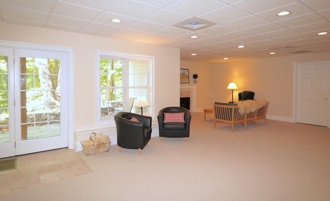 32 Briar Street Rowayton, CT 06853 - Photo 31 of 40 a living room with furniture and a large window