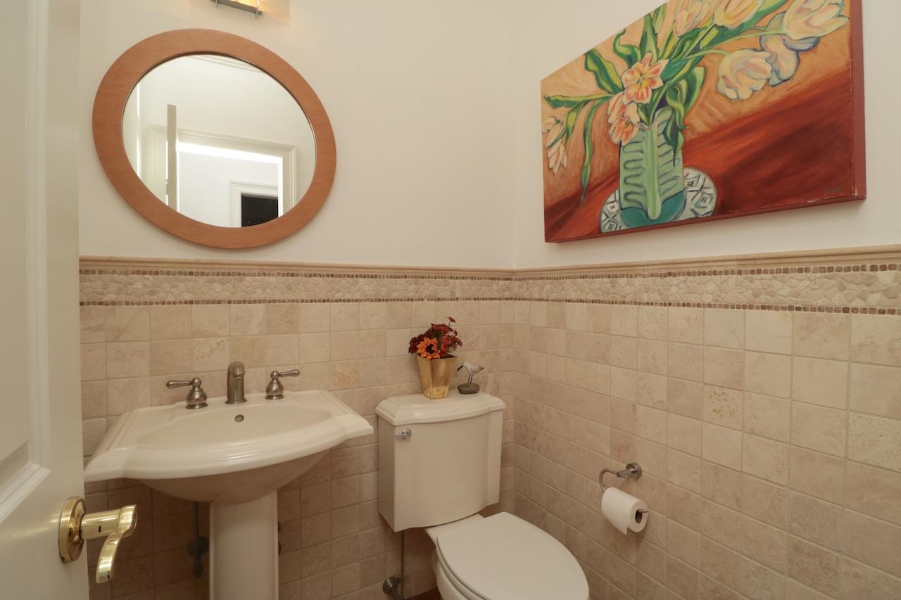 32 Briar Street Rowayton, CT 06853 - Photo 33 of 40 a bathroom with a sink and a mirror