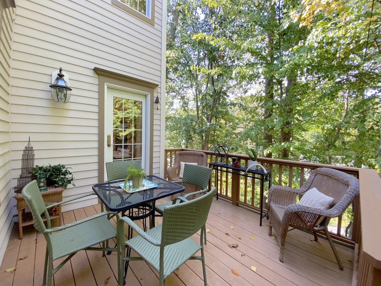 32 Briar Street Rowayton, CT 06853 - Photo 38 of 40 a balcony with wooden floor and outdoor seating