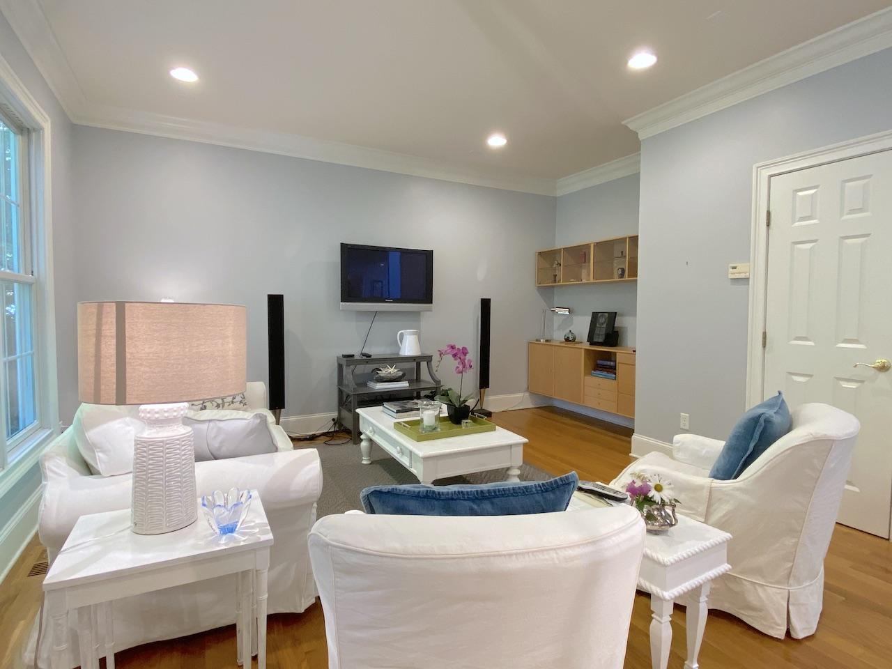 32 Briar Street Rowayton, CT 06853 - Photo 6 of 40 a living room with furniture and a flat screen tv