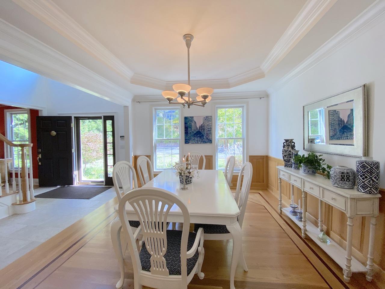 32 Briar Street Rowayton, CT 06853 - Photo 8 of 40 a view of a dining room with furniture window and wooden floor