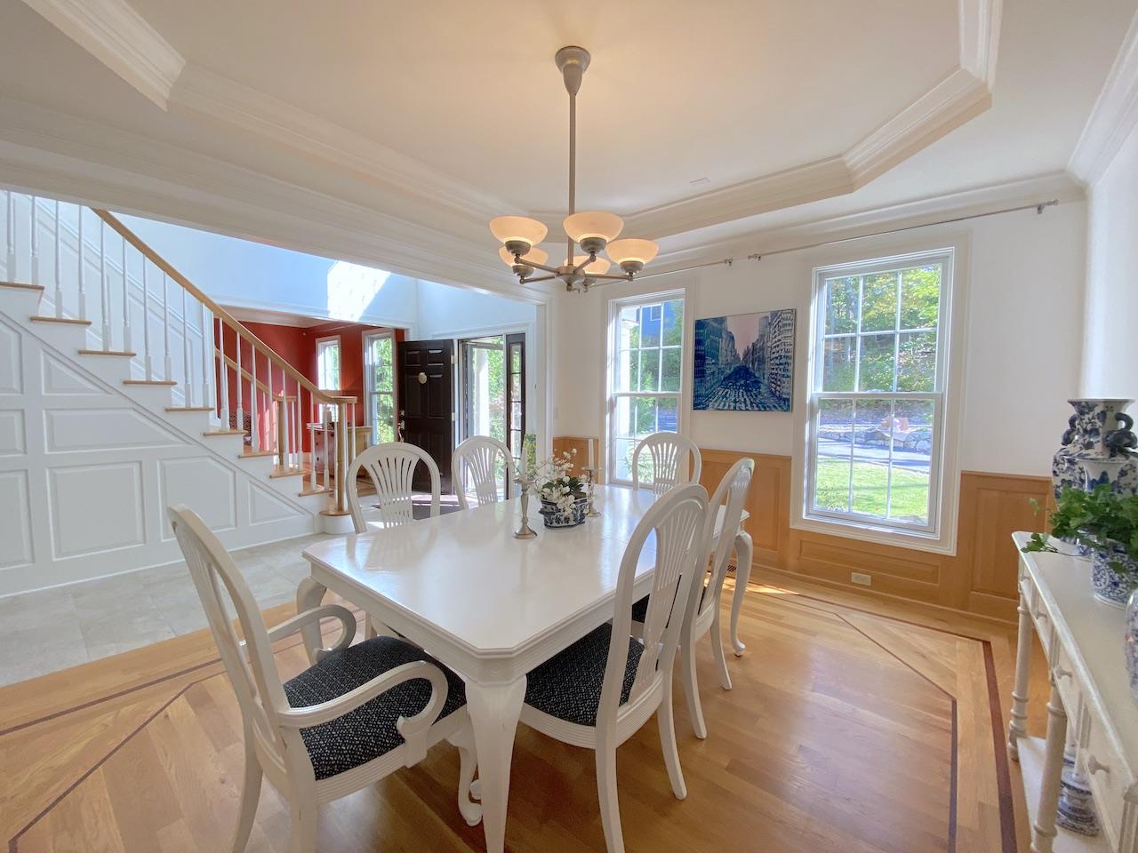 32 Briar Street Rowayton, CT 06853 - Photo 9 of 40 a view of a dining room with furniture window and wooden floor