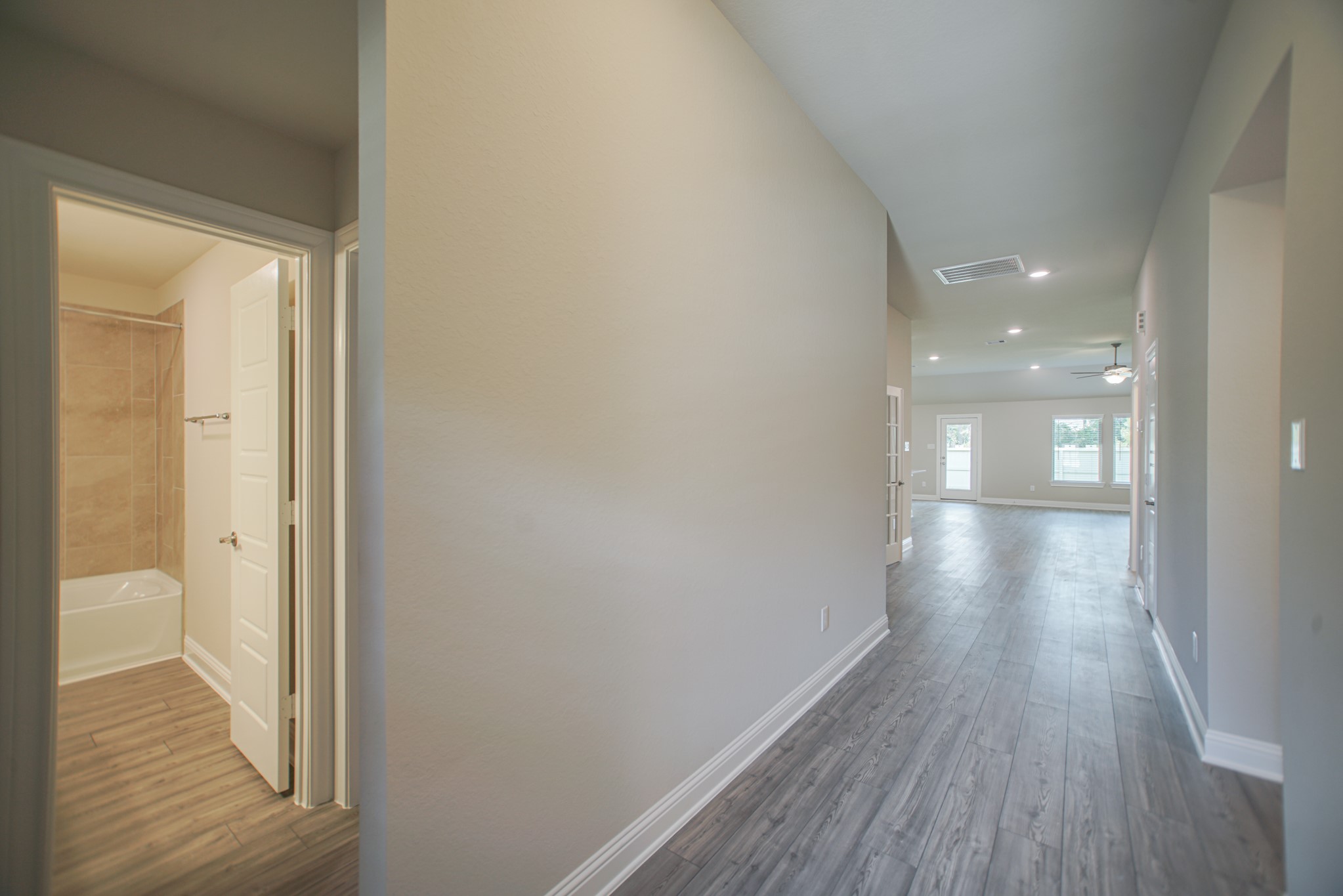 17112 Coneflower Place Conroe, TX 77385 - Photo 3 of 27 a view of gallery with wooden floor