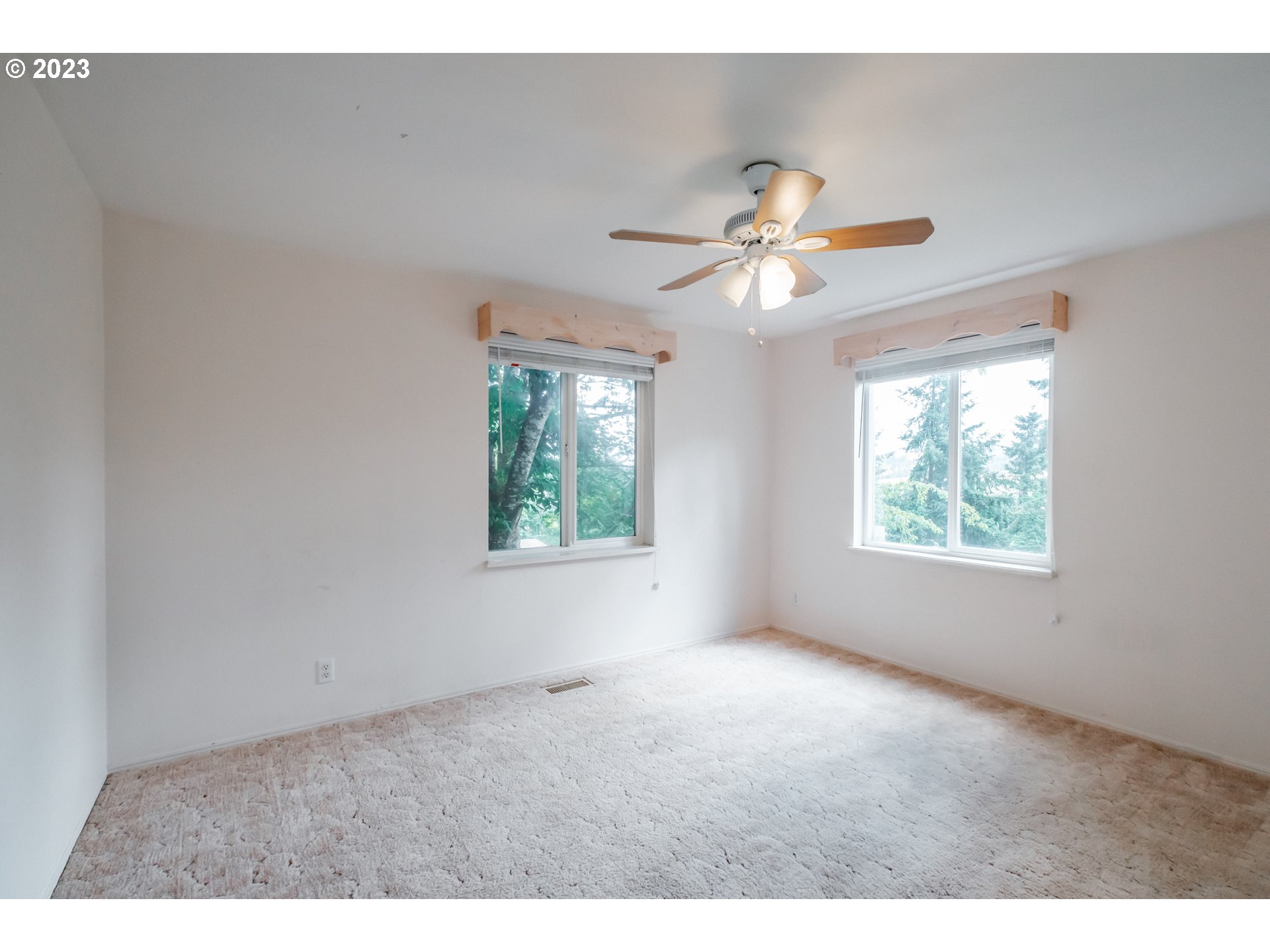 524 6th Street Scotts Mills, OR 97375 - Photo 21 of 41 a view of room with a ceiling fan and window