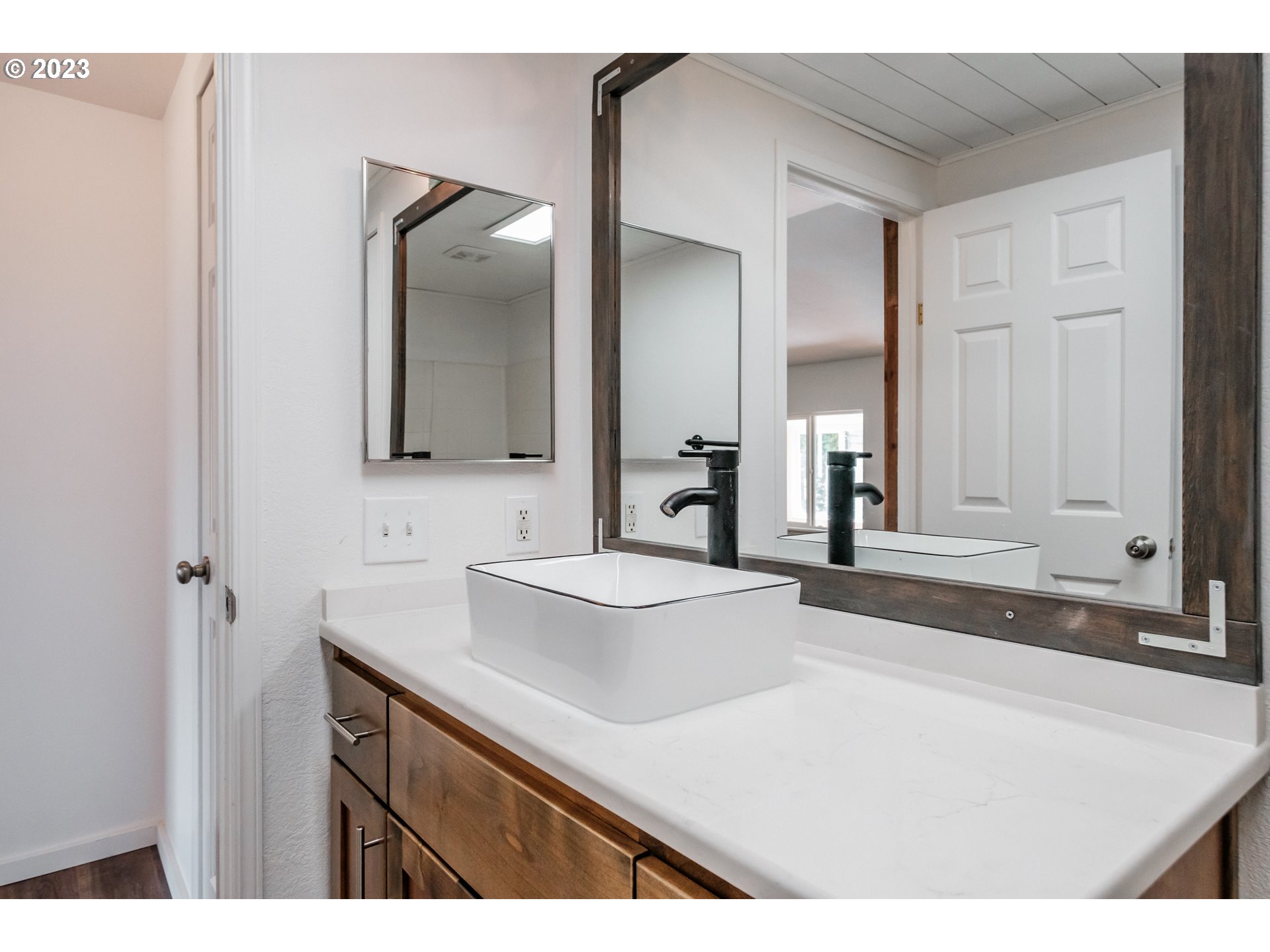 524 6th Street Scotts Mills, OR 97375 - Photo 24 of 41 a bathroom with a sink and a mirror