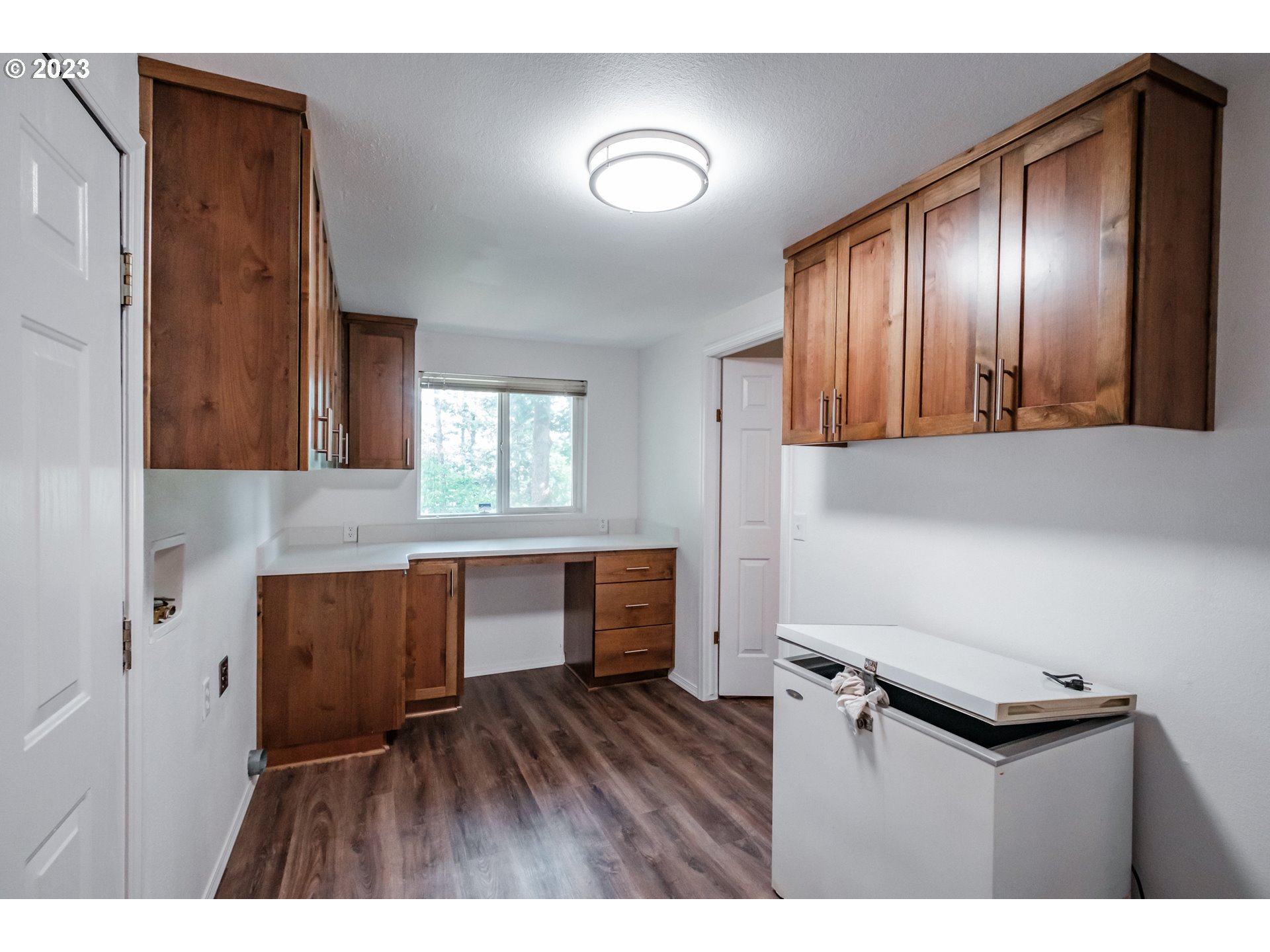 524 6th Street Scotts Mills, OR 97375 - Photo 25 of 41 a kitchen with cabinets and wooden floor