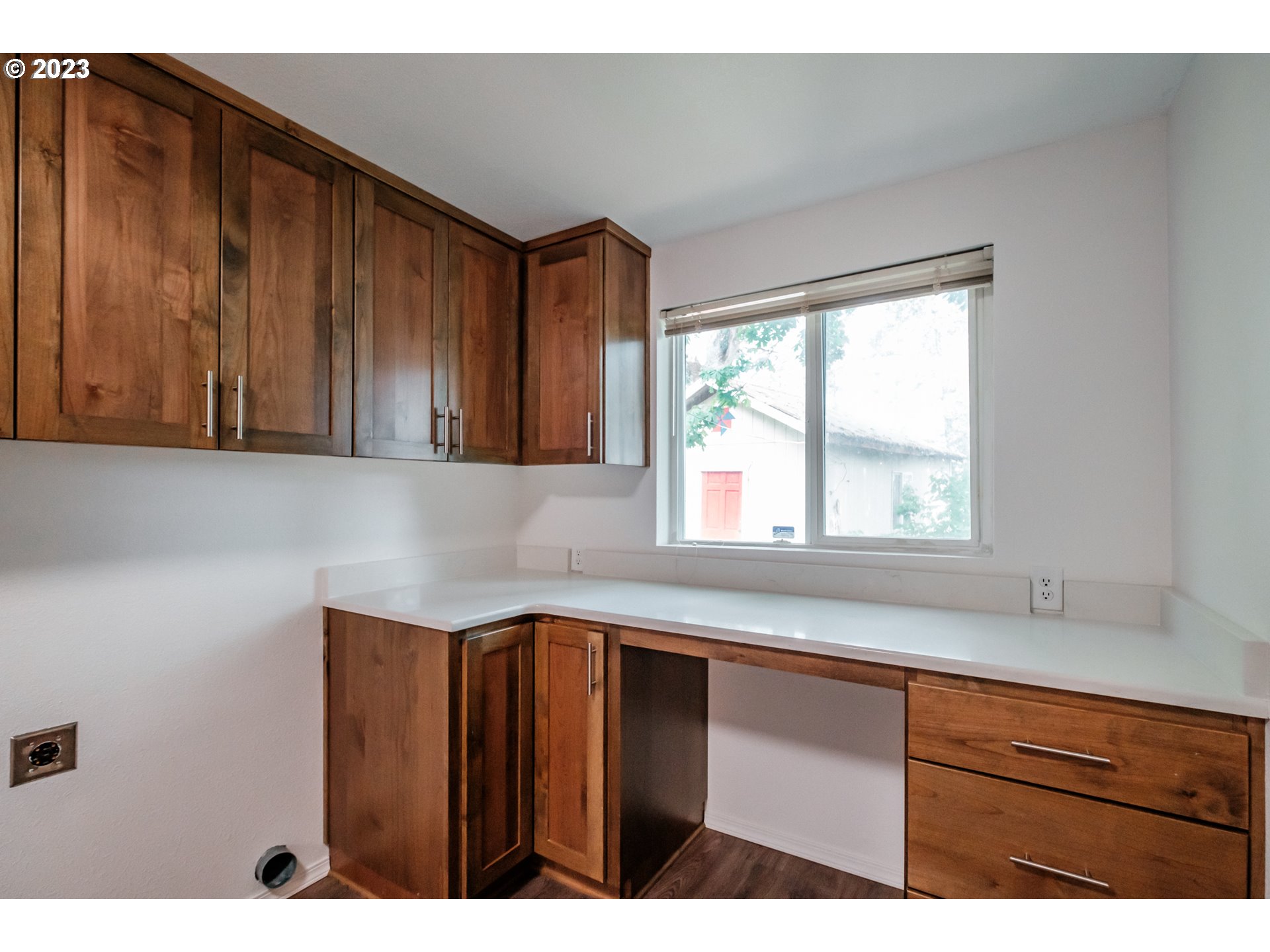 524 6th Street Scotts Mills, OR 97375 - Photo 26 of 41 a kitchen with a sink a window and cabinets