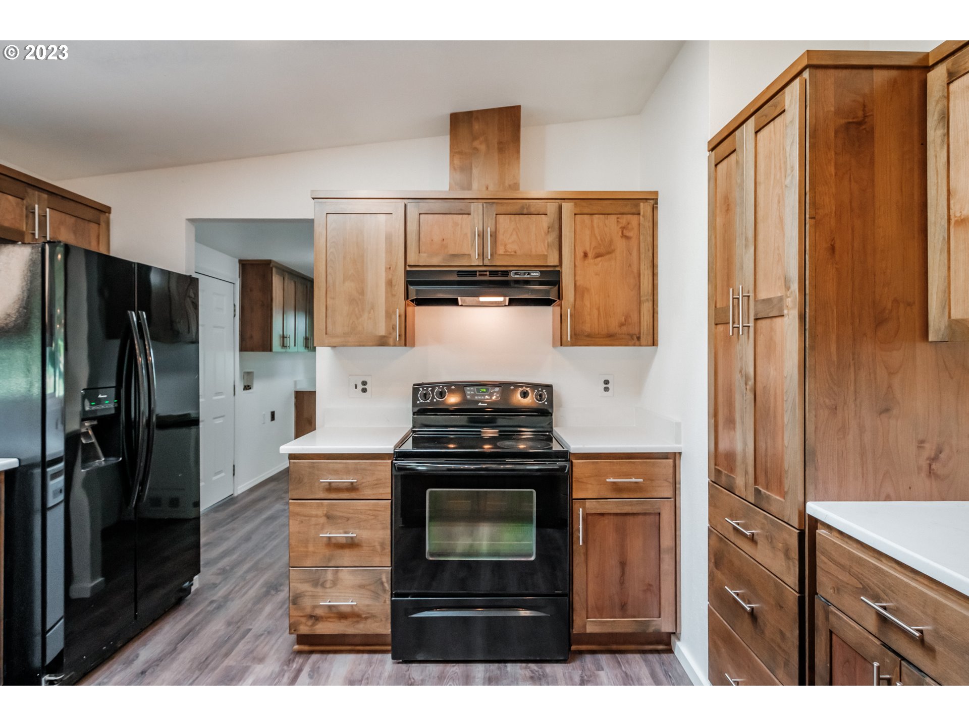 524 6th Street Scotts Mills, OR 97375 - Photo 6 of 41 a kitchen with a stove and a refrigerator