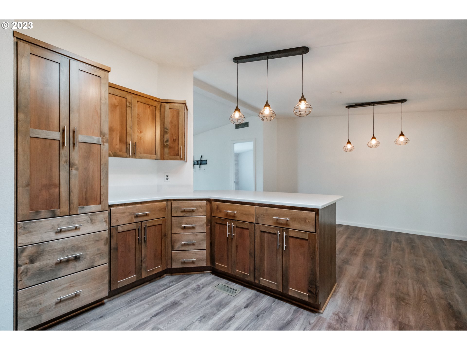 524 6th Street Scotts Mills, OR 97375 - Photo 8 of 41 a kitchen with stainless steel appliances granite countertop a sink and cabinets with wooden floor