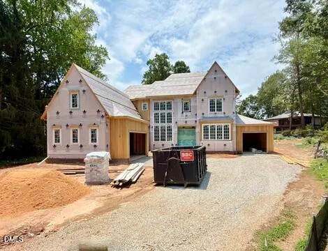 a front view of house with yard outdoor seating and barbeque oven
