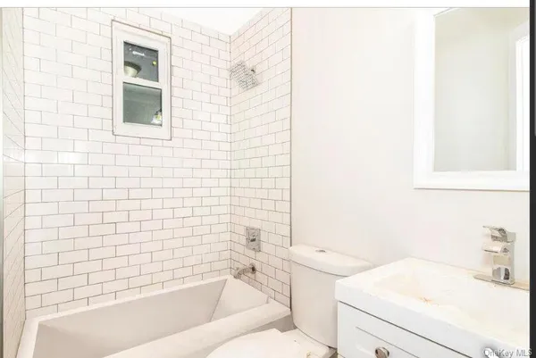 a bathroom with a sink and a bathtub