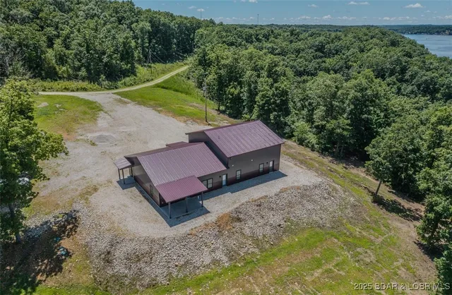 $3,589,900 | 26450 Eagle Point Road, Unit 1415 47' LAKEFRONT, Barnett, MO 65011