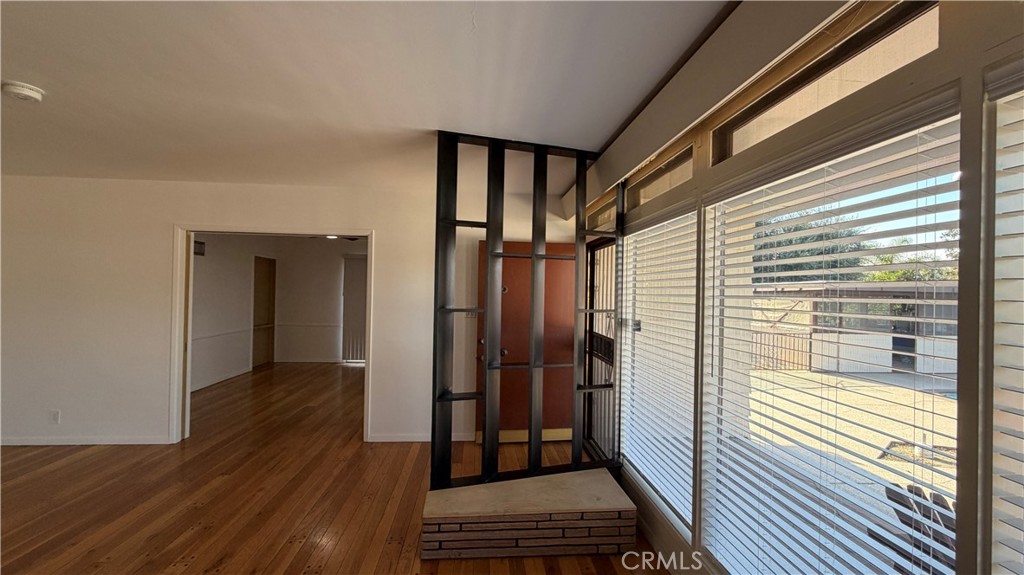3590 Buchanan Street Riverside, CA 92503 - Photo 11 of 73 a view of a room with wooden floor