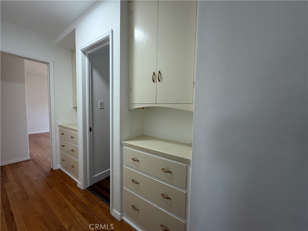 3590 Buchanan Street Riverside, CA 92503 - Photo 33 of 73 a room with a dresser and a mirror