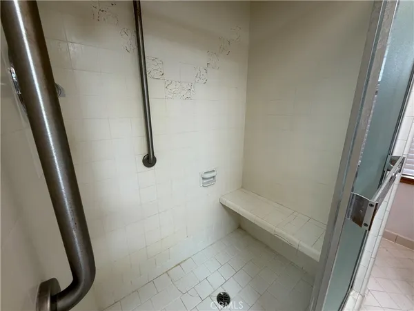 an empty room with wooden floor