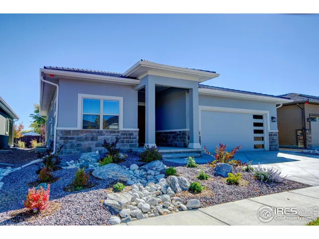 a view of house with outdoor seating