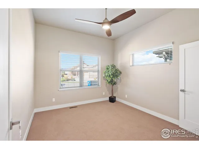 a view of a backyard of the house