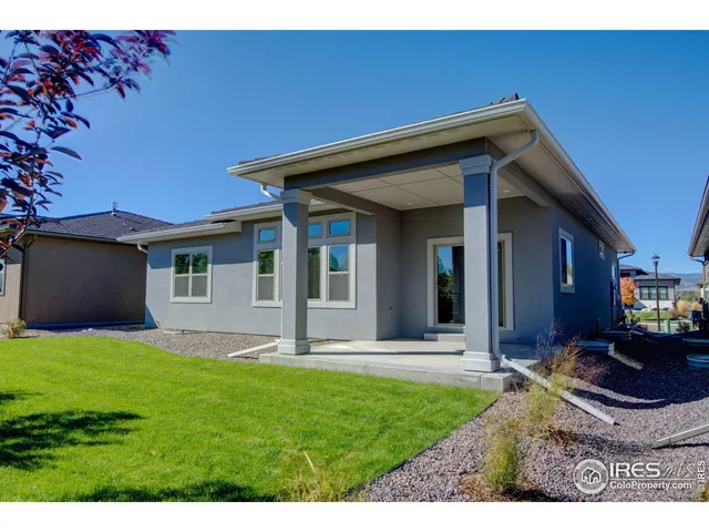 an aerial view of residential houses and outdoor space