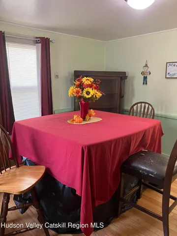 a bedroom with a bed and dresser