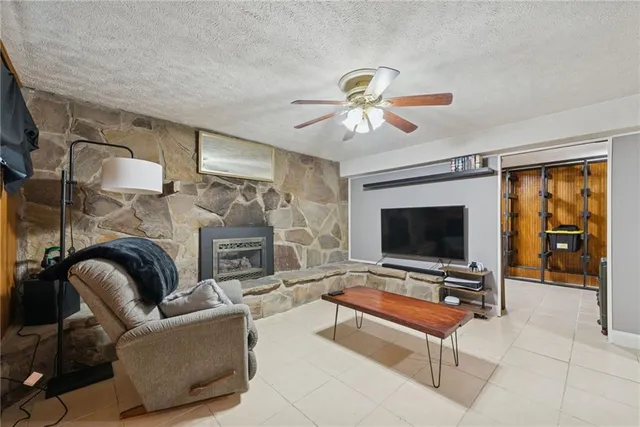 a bathroom with a toilet sink and shower