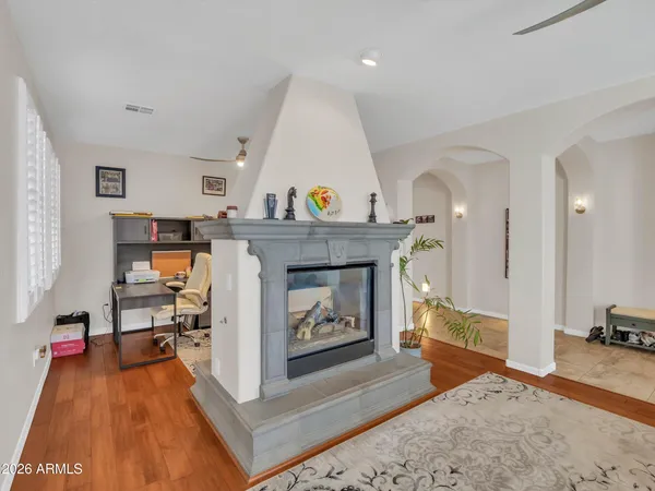 a living room with furniture and a rug