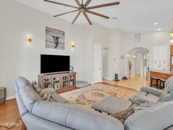 a bathroom with a granite countertop bathtub shower sink and mirror