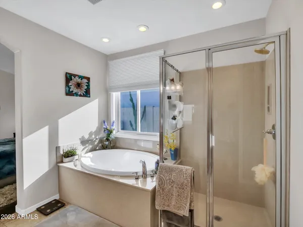 a bathroom with a sink double vanity and a mirror