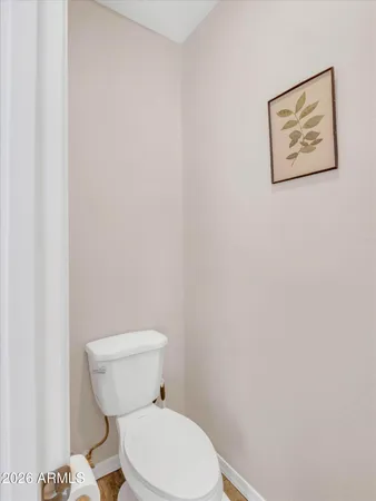 a bedroom with bed and flat screen tv