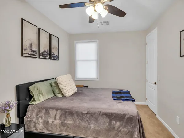 a view of livingroom with workspace and a window