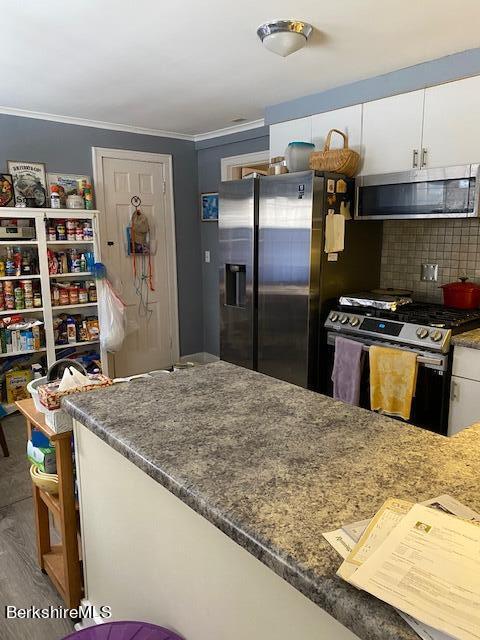 85 N Road Monroe, MA 01247 - Photo 3 of 11 a kitchen with stainless steel appliances granite countertop a sink stove and refrigerator