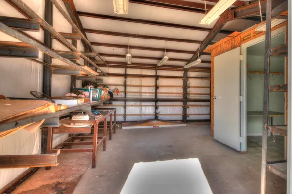 a view of kitchen with furniture and cabinets