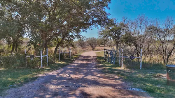 a view of a town with barn house