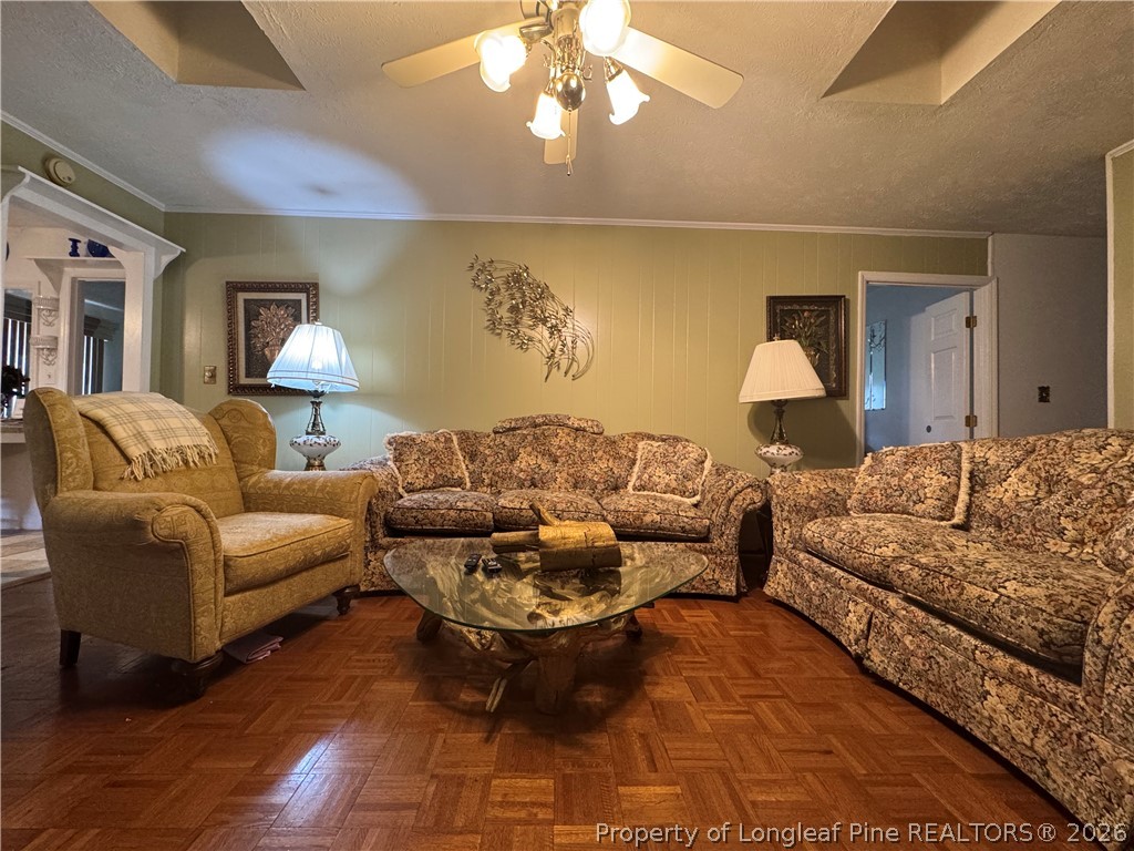 408 Old Farm Road Raeford, NC 28376 - Photo 17 of 27 a living room with furniture and a lamp