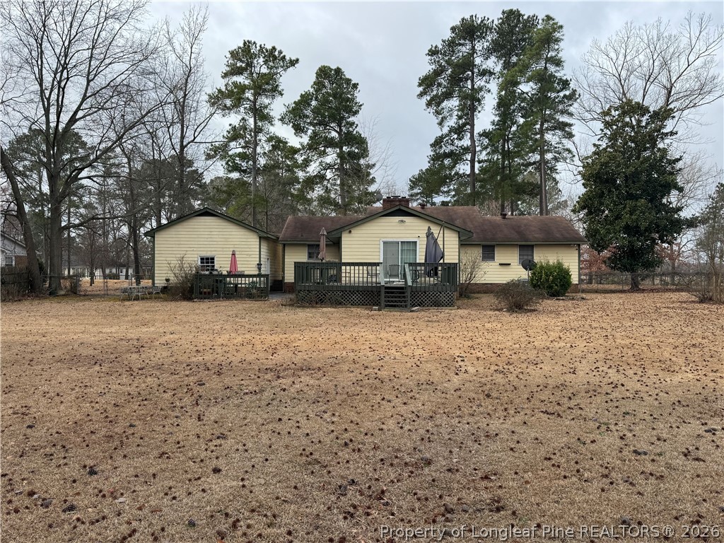 408 Old Farm Road Raeford, NC 28376 - Photo 6 of 27 a front view of a house with a yard